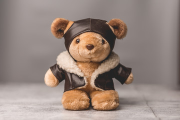 Light brown teddy bear with pilot suit © mathefoto
