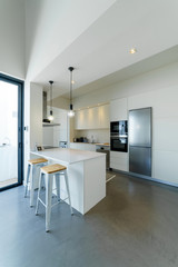 Modern house with garden swimming pool and wooden deck