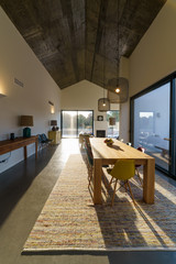 Modern house with garden swimming pool and wooden deck