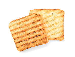 Tasty toasted bread on white background, top view