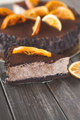 Chocolate cake with cream and profiterole