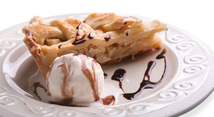 Plate with piece of tasty apple pie and ice-cream on white background