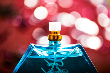 Women's perfume. In a blue bottle