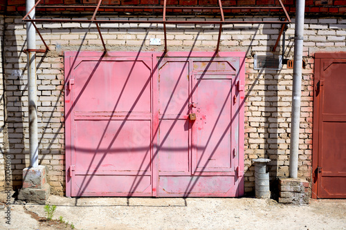 Unusual Garage Doors In Pink Color Stock Photo And Royalty Free Unusual Garage Doors In Pink Color