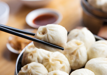 Steamed Xiaolongbao with chopsticks 