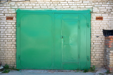 Green garage doors.
