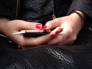 Female hands with phone