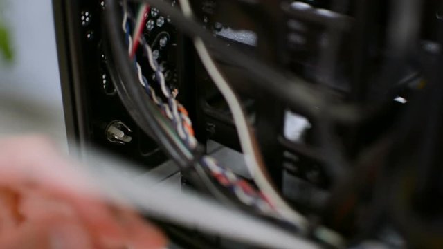 High pressure cleaning inside PC personal computer chasis case hand closeup