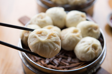 Steamed Xiaolongbao with chopsticks 