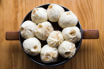 Top view of Chinese food, Xiaolongbao. Steamed Xiaolongbao in The Bamboo Basket.