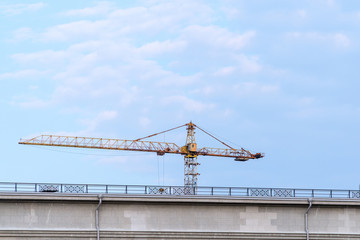 Construction crane against the building