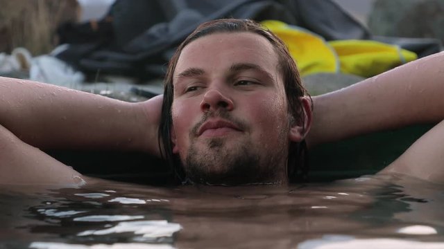 Enjoying hot spring in Iceland