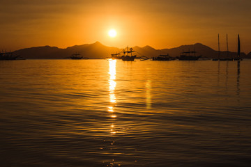 Sunset at the sea. Philippine boats at sea, Boracay, El Nido, Philippines