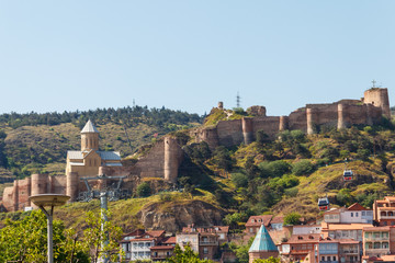 Naklejka premium View on impregnable ancient fortress Narikala and church of St. Nicholas in Tbilisi, Georgia