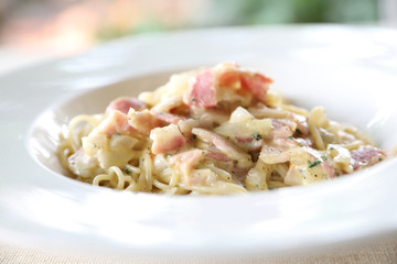 Spaghetti carbonara white sauce with bacon and cheese