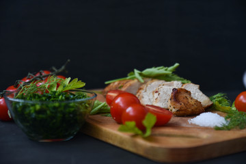 Chicken with tomatoes, parsley and dill