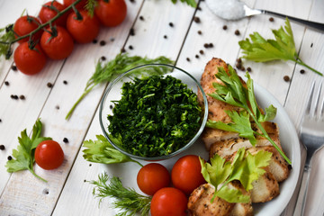 Chicken with tomatoes, parsley and dill