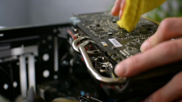 Electric circut board GPU videocard wet cleaning from dust by professional cloth