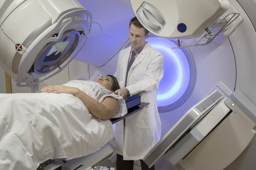 Woman Receiving Radiation Therapy Treatments for Breast Cancer - obrazy, fototapety, plakaty