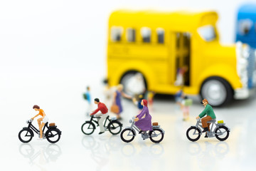 Miniature people:  send student to school for study. Image use for Children's society.