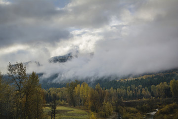 Clouds covering hills in British Columbia