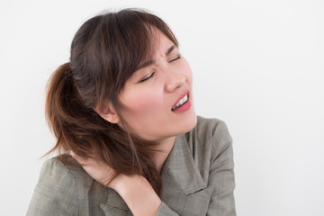 woman with shoulder or neck pain; portrait of asian woman suffering from shoulder or neck pain, stiffness, injury, chronic bone or muscle injury concept; asian young adult woman health care model