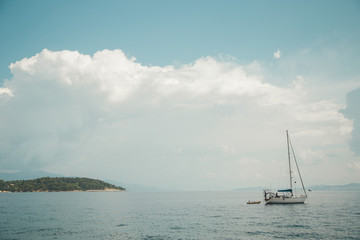 yacht stands at sea in the canal at summer day