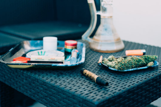 Marijuana plant with smoking devices
