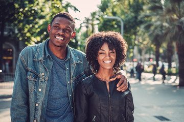 Fototapeta premium Young happy black couple outdoors