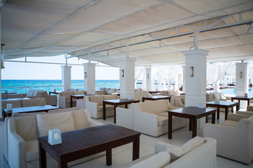 Interior of Elite comfortable beach resort with palm trees and pools. restaurant beach club highest level at resort for holiday in beach season.