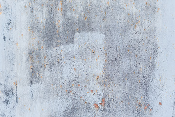 Wall fragment with scratches and cracks