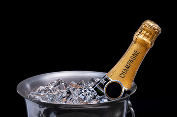 Champagne in bucket on black © Vaceslav Romanov