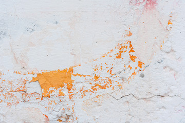 Wall fragment with scratches and cracks