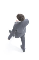 Confident businessman goes forward. view from above