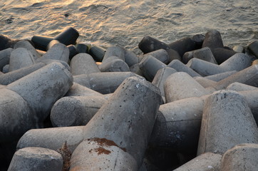 Tetrapods. Breakwater background, texture close up