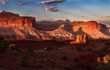 Glorious sunset on the rock formations of Capitol Reef National Park in Utah , USA. © SEvelyn