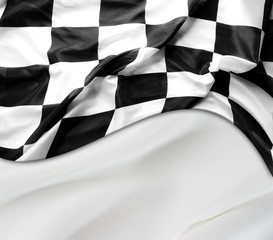 Checkered racing flag on white fabric