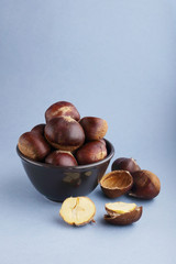 fresh chestnuts isolated on white background