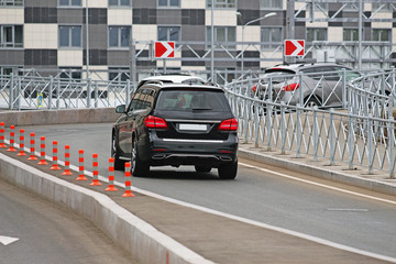 car traffic before a sharp turn