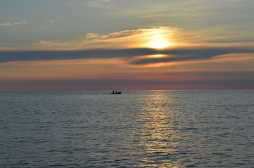 Fototapeta na wymiar Zachód słońca nad spokojnym morzem, Istria
