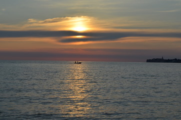 Naklejka na ściany i meble Zachód słońca nad spokojnym morzem, Istria