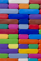 Abstract Background. Background with different colorful shapes plastic blocks . Geometric shapes in different colors.