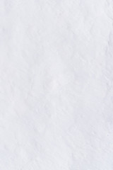 Adobe whitewashed wall in natural white color, traces of brush, texture, background with copy space for text or objects