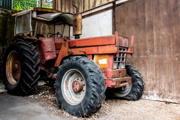 Old Farm tractor waiting for a lovely person to take care of it.