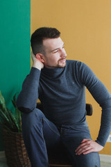 handsome young guy being photographed in studio