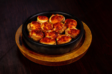 Baked champignons with cheese