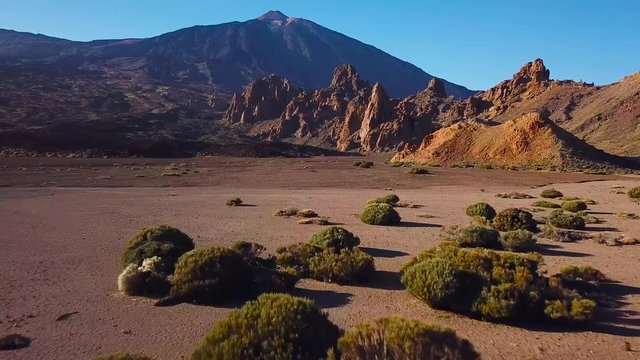 Aerial view of the Teide National Park, flight over the mountains and hardened lava. Tenerife, Canary Islands