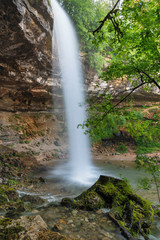 Fototapeta na wymiar French landscape - Jura. Saut Girard waterfall in the Jura mountains after heavy rain.