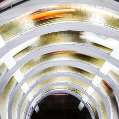 Circular ramp in parking garage Spiral shaped at night