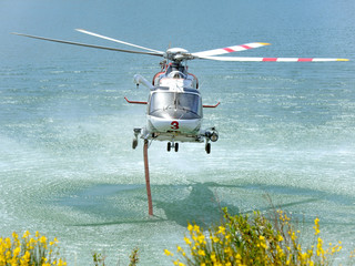 Agusta AW-139 Fire Department helicopter  takes on Water
